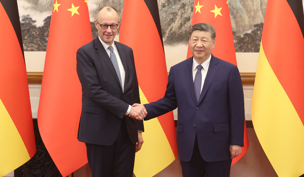 习近平会见德国总理默茨